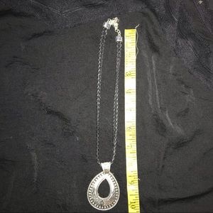 Costume necklace with leather like chain